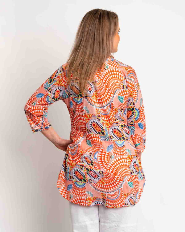 Long Pleated Top with Subtle Frills and 3/4 Raglan Sleeve in Orange Ge ...