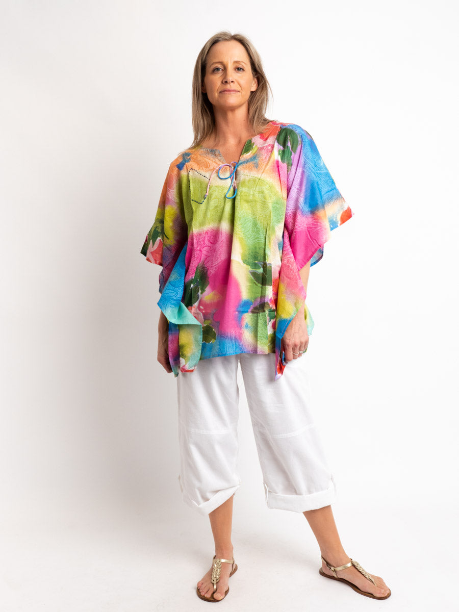 Too Easy Poncho Style V-neck Top in Embroidered Pastels