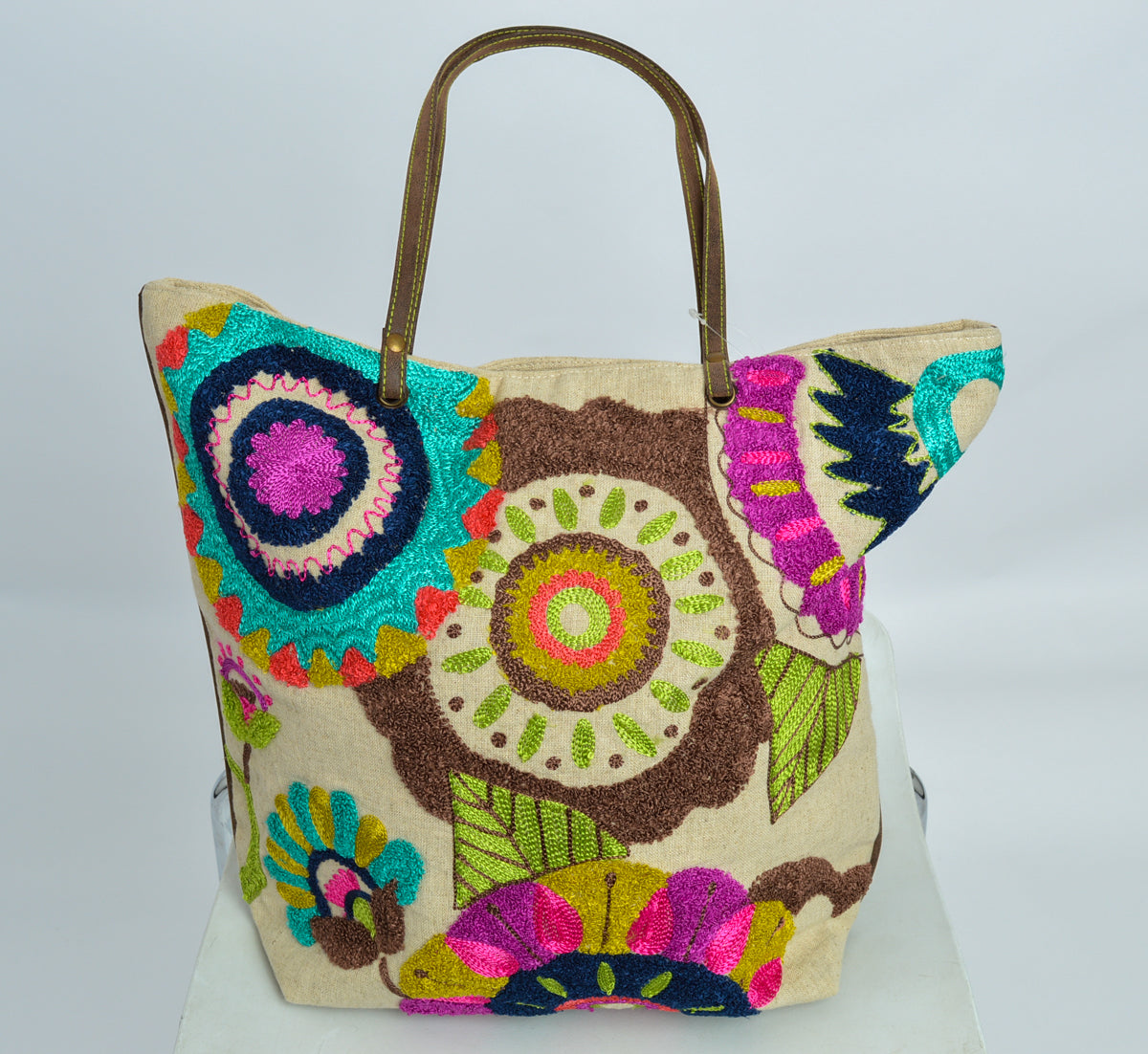 Beautifully embroidered canvas tote bag with leather handles