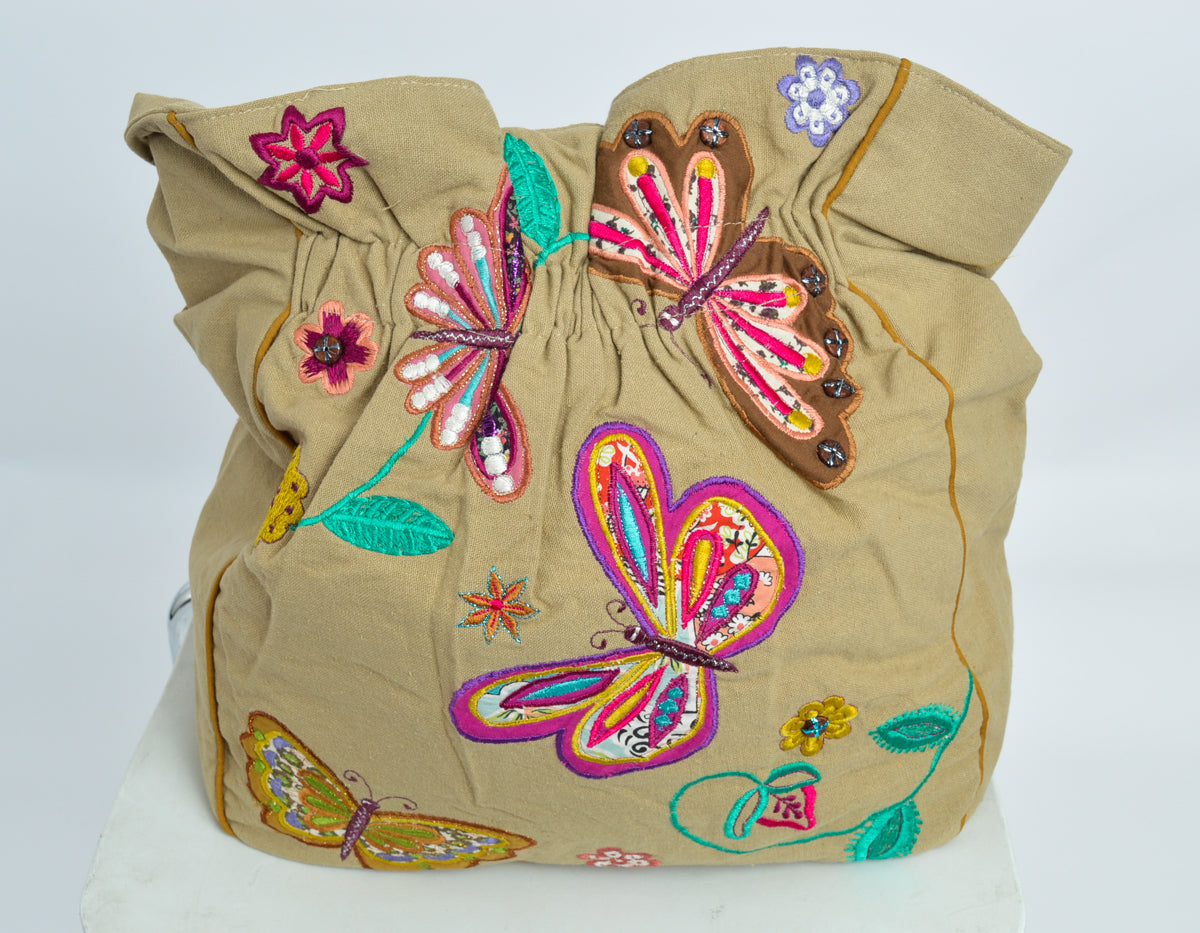 Beautiful casement bag colourfully decorated with embroidery and applique