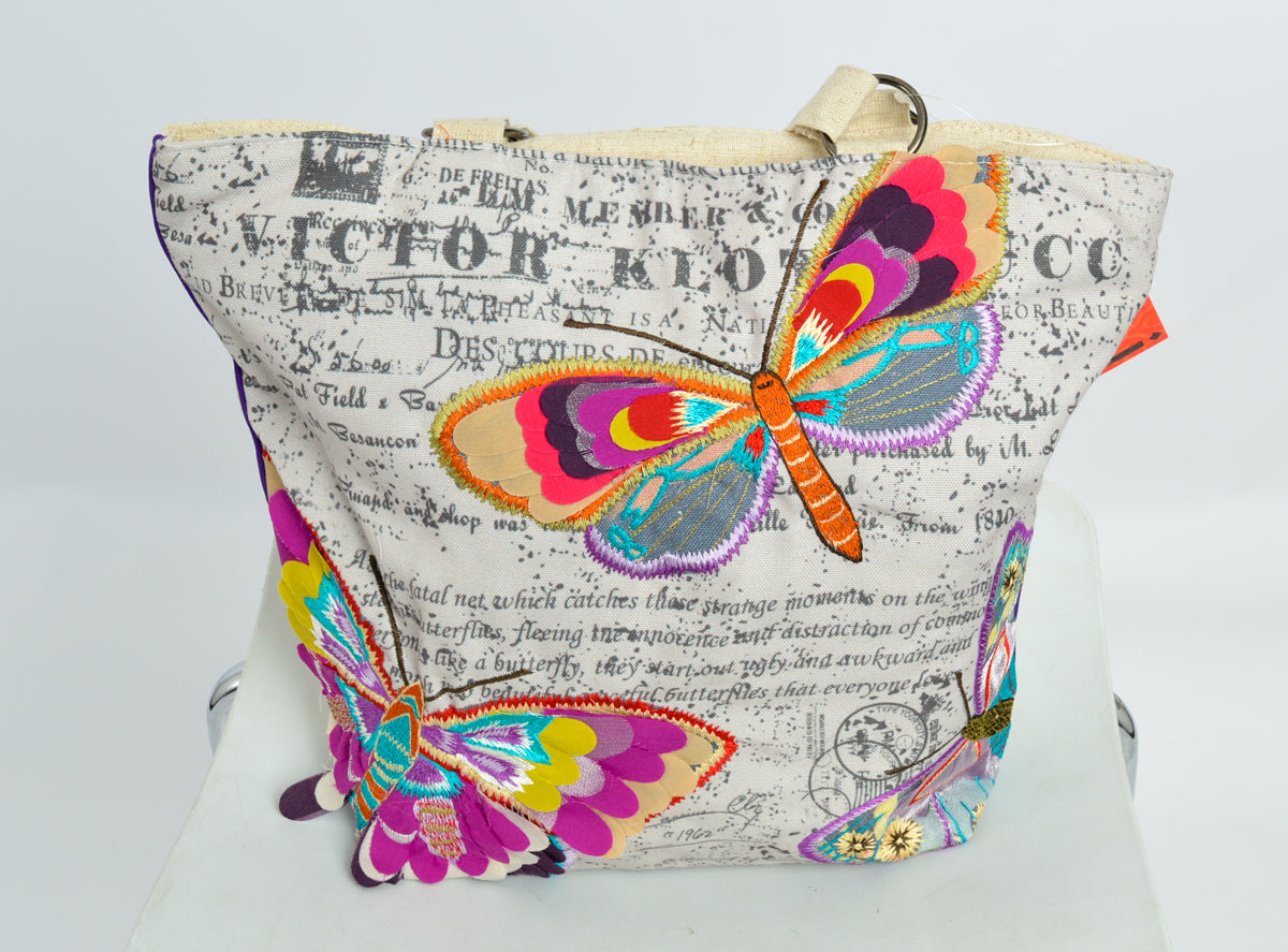 Attractive butterfly feathered tote bag with butterfly themed funky applique and embroidery